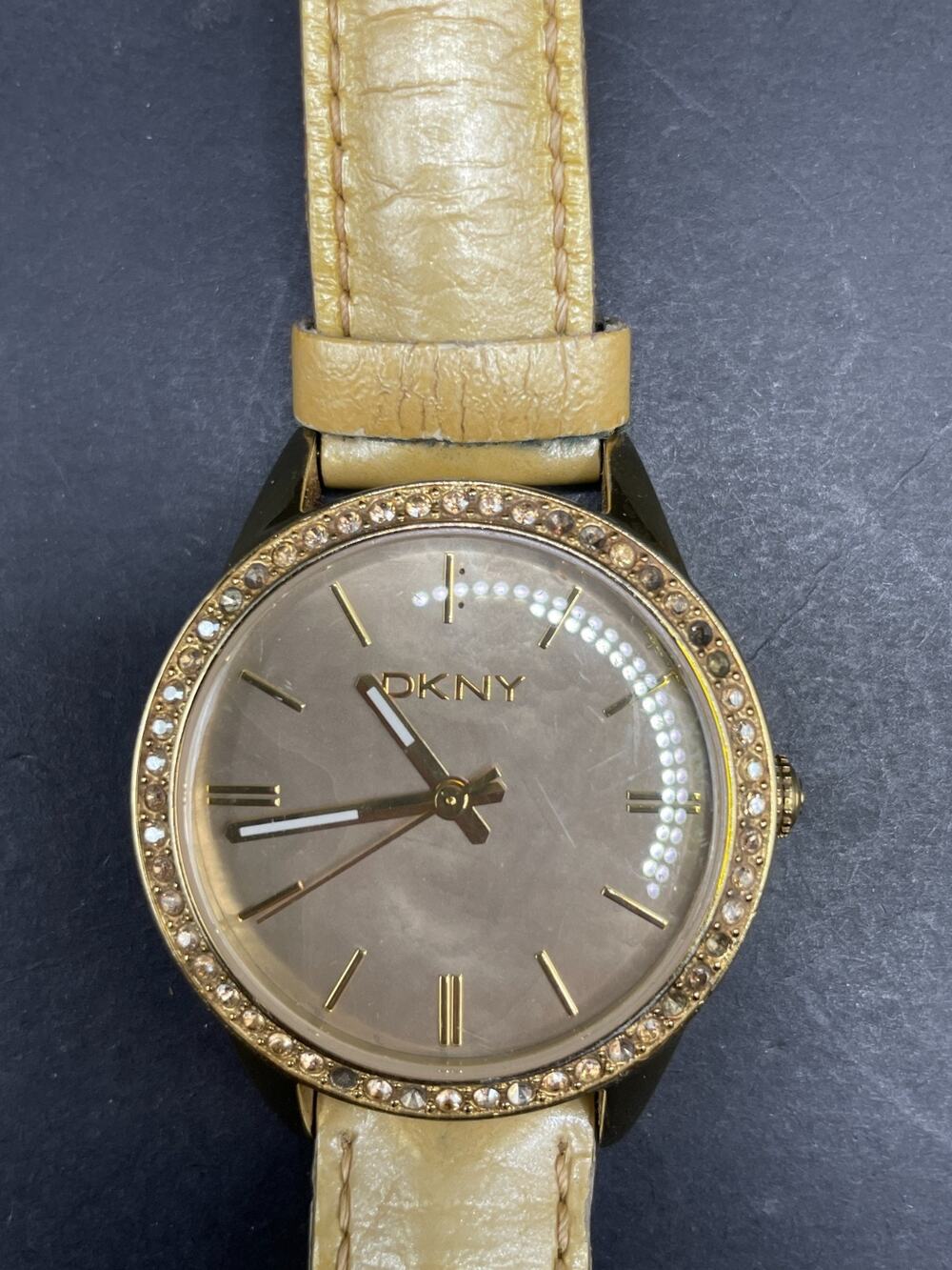 DKNY NY-4759 Mother of Pearl Dial Crystal Bezel Gold Tone Watch Leather Band